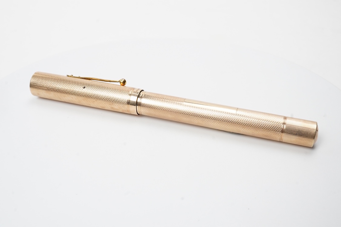 A large Waterman fully covered gold filled fountain pen, lever filler, in fine barley pattern - No.2 Waterman nib